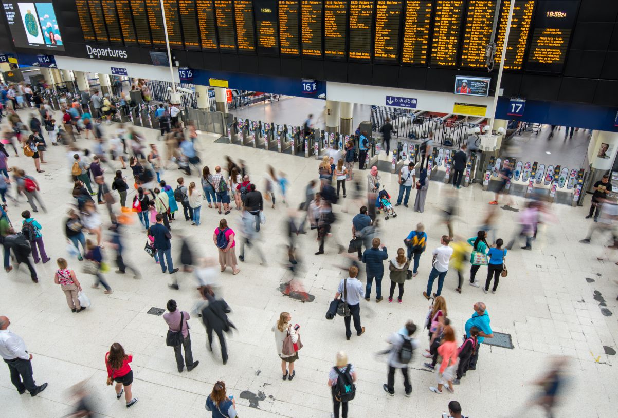 People at busy train station