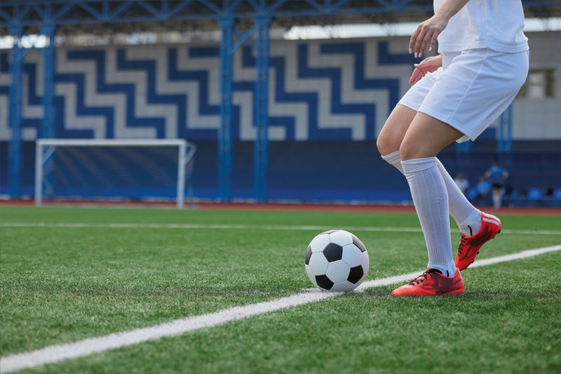 Woman playing football